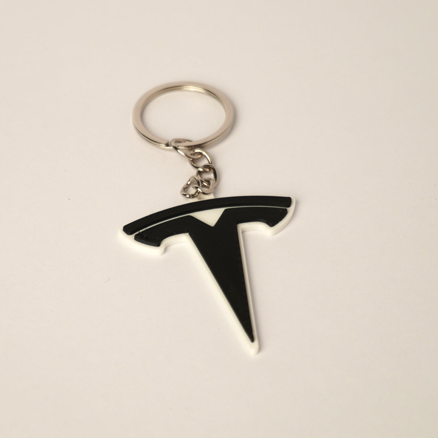 Breloc Tesla